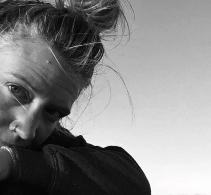 Black-and-white portrait of Lindsey Rose, end-of-life doula